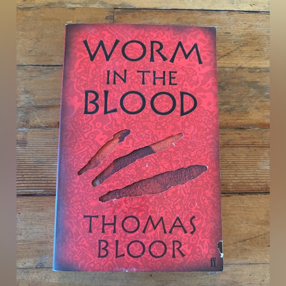 3/$20 Worm in the Blood Book by Thomas Bloor